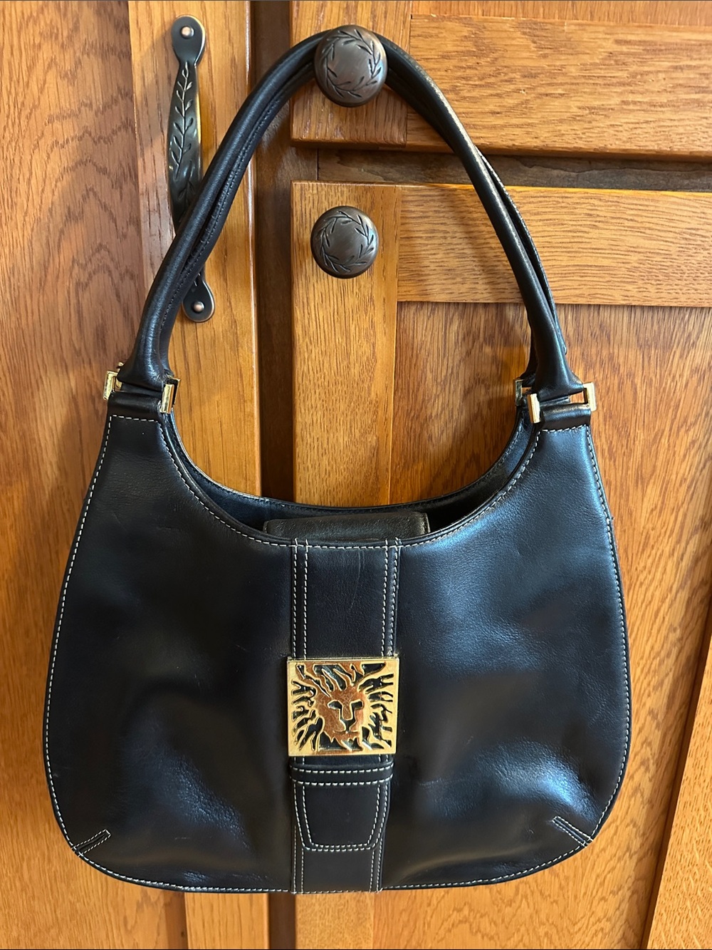 Anne Klein Vintage Black Leather Shoulder Bag with Gold Lion Accent